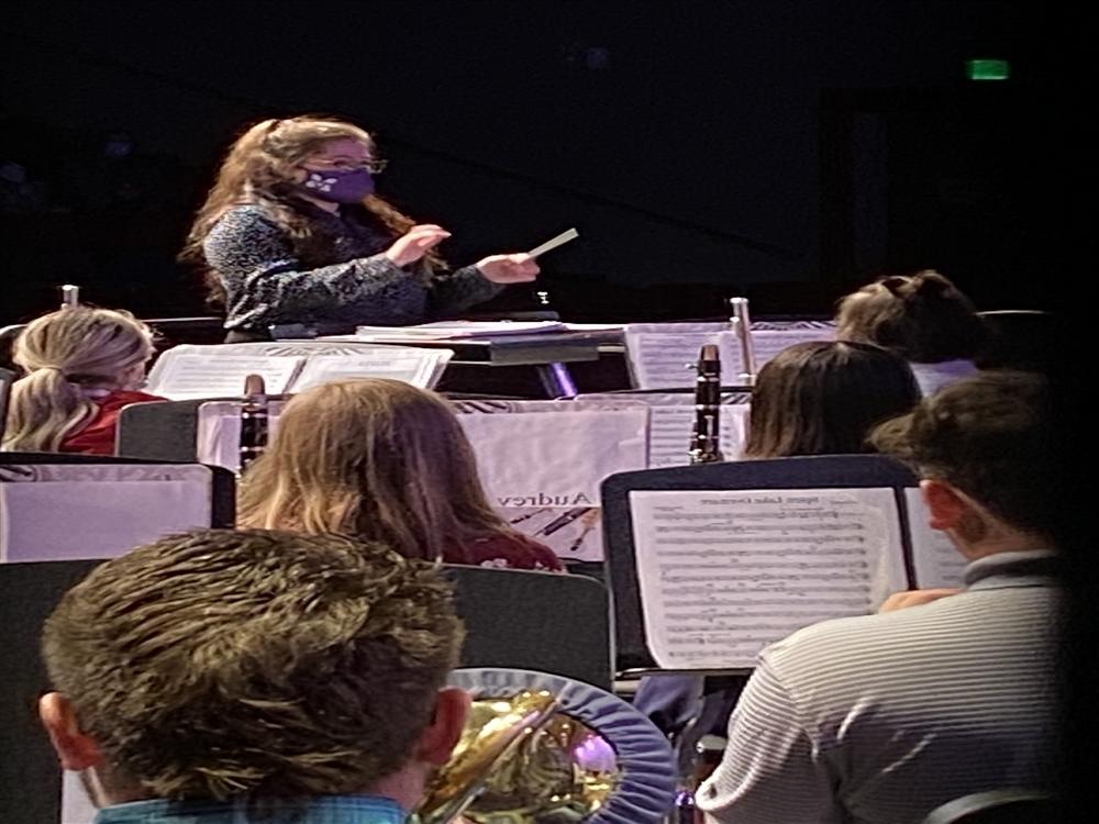 Anna Brown directing student band